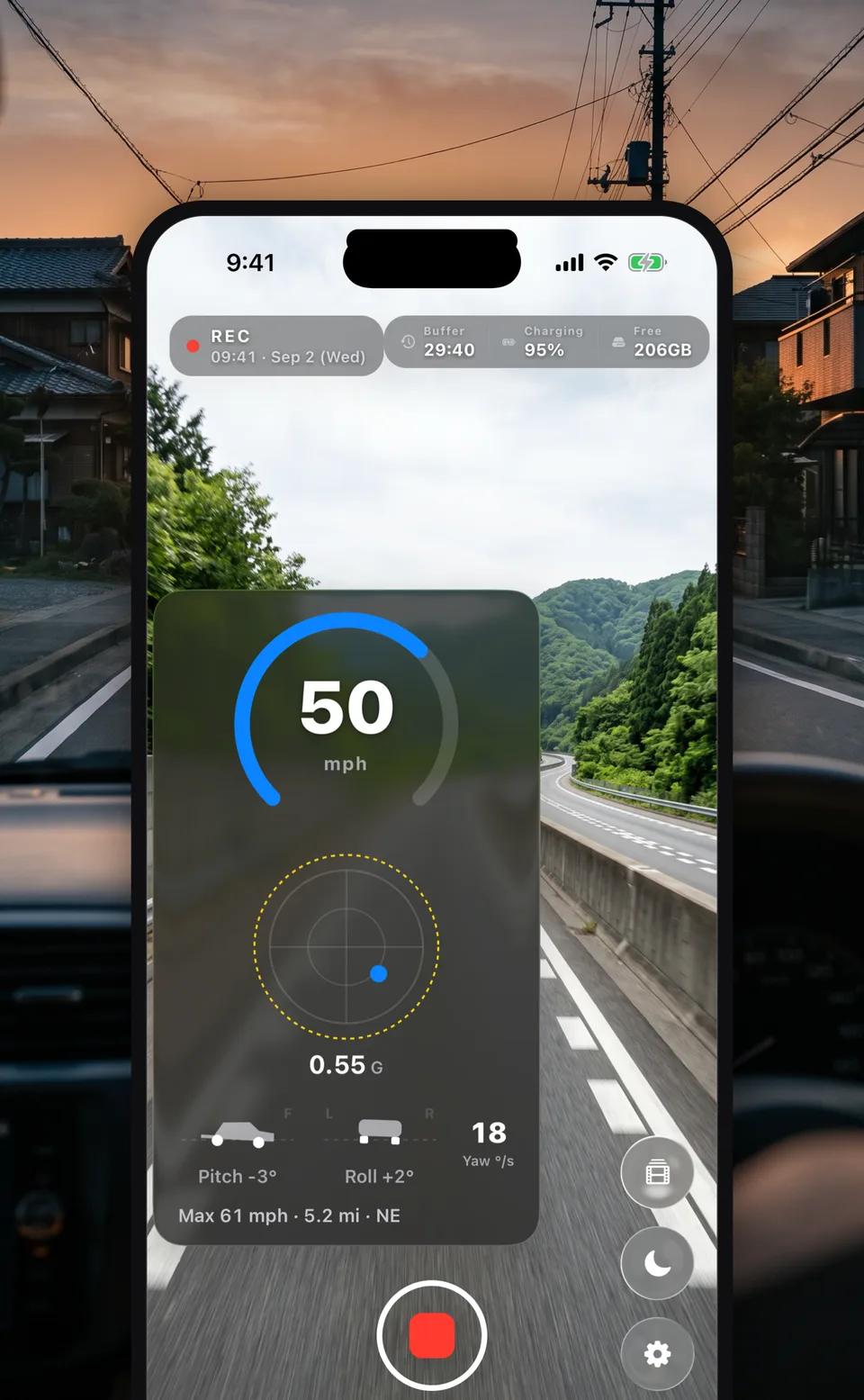 An iPhone in a dashboard holder recording with Kururec. The screen shows the road ahead with 50 mph, a G-force traction circle, and the car's pitch and roll overlaid.